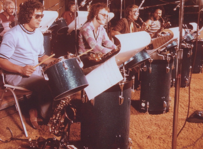 Photo from Hal's big Band.  Reward doesn't include side drums. LEFT TO RIGHT FRONT ROW SAXES:  JAY MIGLIORI*** TOM SCOTT****BILL "PERK" PERKINS****JACKIE KELSO....... UPPER RIGHT:LEW MACREARY TROMBONE, UPPER L